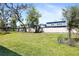 A well-maintained and fenced-in backyard provides ample space and privacy at 14180 Samoa Hill Ct, Riverview, FL 33569