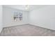 A bright and airy bedroom with a ceiling fan at 14180 Samoa Hill Ct, Riverview, FL 33569