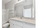 Bathroom vanity with a sink, a toilet, and a shower/tub at 1869 Hovenweep Rd, Wesley Chapel, FL 33543