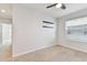 Bedroom with neutral walls, ceiling fan, and carpeted floors at 1869 Hovenweep Rd, Wesley Chapel, FL 33543