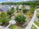 Aerial view of a fenced dog park area with play structures and seating at 1869 Hovenweep Rd, Wesley Chapel, FL 33543