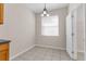 Cozy breakfast nook with tile flooring, a window, and convenient access to the kitchen and pantry at 200 Fairmont Dr, Spring Hill, FL 34609