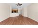 Open floor plan living room with view to the kitchen featuring a breakfast bar at 200 Fairmont Dr, Spring Hill, FL 34609