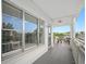 Balcony view featuring decorative railings and access to condo unit at 2428 Columbia Dr # 72, Clearwater, FL 33763