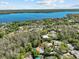 An aerial shot highlights the lake views and location of this beautiful home at 3267 Westcott Ct, Palm Harbor, FL 34684
