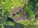 A top-down view of an expertly manicured garden bed shows an eye-pleasing design at 3267 Westcott Ct, Palm Harbor, FL 34684
