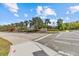 Inviting community entrance with lush landscaping and clear signage for Cobbs Landing, enhancing curb appeal at 3267 Westcott Ct, Palm Harbor, FL 34684