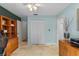 Spacious home office with closet, ample storage, and travertine tile flooring at 3267 Westcott Ct, Palm Harbor, FL 34684