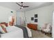 Spacious main bedroom featuring neutral walls, walk-in closet, and en-suite bathroom with dual sinks at 3267 Westcott Ct, Palm Harbor, FL 34684