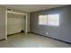 Bedroom featuring a window and a closet at 3503 Casablanca Ave, St Pete Beach, FL 33706