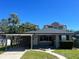 Charming single-story home featuring a carport and well-maintained front yard in a quiet neighborhood at 3503 Casablanca Ave, St Pete Beach, FL 33706