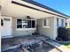 Inviting front porch with a ceiling fan and ample space at 3503 Casablanca Ave, St Pete Beach, FL 33706