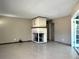 Living room with painted brick fireplace and lots of space at 3503 Casablanca Ave, St Pete Beach, FL 33706
