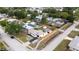 Aerial view of the landscaped backyard, patio, and updated home exterior at 4601 71St N Ave, Pinellas Park, FL 33781