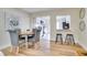 Charming dining area featuring modern furniture and an open view of the kitchen at 4601 71St N Ave, Pinellas Park, FL 33781