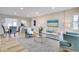 Cozy living room featuring an open floor plan that leads to the kitchen and dining area at 4601 71St N Ave, Pinellas Park, FL 33781