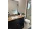 Bathroom featuring granite countertop vanity, mirror, toilet, shower, and tiled flooring at 520 Oak Creek Dr, Brandon, FL 33511