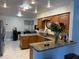 Eat in kitchen with stainless steel appliances, granite countertops, and updated lighting at 520 Oak Creek Dr, Brandon, FL 33511