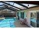 Relaxing screened-in pool area with ample seating, perfect for outdoor entertaining at 520 Oak Creek Dr, Brandon, FL 33511