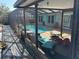 Screened-in pool area offering shaded lounging and outdoor living space at 520 Oak Creek Dr, Brandon, FL 33511