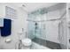 Modern bathroom showcasing a glass-enclosed shower with stylish tilework and a spacious layout, complemented by chic fixtures at 5701 Bahia Del Mar Cir # 408, St Petersburg, FL 33715
