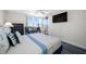 Bedroom with large windows, seating area, and ample natural light at 5701 Bahia Del Mar Cir # 408, St Petersburg, FL 33715