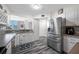 Bright, updated kitchen with stainless steel appliances and ample counter space and views at 5701 Bahia Del Mar Cir # 408, St Petersburg, FL 33715