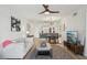 Open-concept living room with updated fixtures, wood flooring, and a view into the modern kitchen at 6277 Bahia Del Mar Blvd # 210, St Petersburg, FL 33715