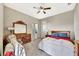 Bedroom with a plush carpet, natural light and a classic wooden dresser at 6324 Brevada Ln, Apollo Beach, FL 33572