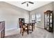Dining room featuring wood furniture, carpet floors and decorative shelving at 6324 Brevada Ln, Apollo Beach, FL 33572