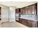 Kitchen boasting stainless steel appliances, granite countertops, a mosaic backsplash, and ample cabinet space at 6324 Brevada Ln, Apollo Beach, FL 33572