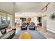 Spacious living room flows into the kitchen, ideal for entertaining Gathering and friends at 6324 Brevada Ln, Apollo Beach, FL 33572