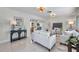 Well-lit living room showcasing terrazzo floors, a decorative table, and an open concept design at 6632 23Rd S St, St Petersburg, FL 33712