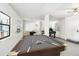 Basement recreation room includes a pool table, foosball table and a door at 6680 67Th N Way, Pinellas Park, FL 33781
