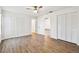 Bedroom with hardwood floors and large closets, providing ample storage space at 6680 67Th N Way, Pinellas Park, FL 33781
