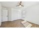 Clean bedroom boasts new floors, a ceiling fan, and a closet for ample storage at 6680 67Th N Way, Pinellas Park, FL 33781