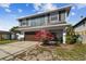 Charming two-story home featuring a well-maintained lawn and an attached garage at 6680 67Th N Way, Pinellas Park, FL 33781