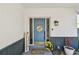 Inviting front door with sidelights and a welcome mat at 6680 67Th N Way, Pinellas Park, FL 33781
