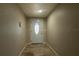 Inviting entryway featuring tile flooring and a stylish white front door with glass detail at 724 Tradewinds Dr, Brandon, FL 33511