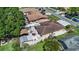 Bird's-eye view of the property, highlighting the backyard patio, fenced yard, and surrounding neighborhood at 8210 Marigold Ave, Tampa, FL 33614