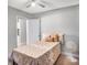 Bedroom featuring a ceiling fan and neutral tones, creating a relaxing atmosphere at 8210 Marigold Ave, Tampa, FL 33614