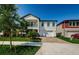 Beautiful two-story home with a balcony, a two-car garage, and a well-manicured lawn at 8314 Capstone Ranch Dr, New Port Richey, FL 34655