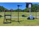 Driving range with golf equipment for players of all skill levels to enjoy a game at 1093 Muirfield Ct, Tarpon Springs, FL 34688