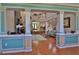 Expansive living area featuring hardwood floors, an open layout, and a view to the upper level at 1093 Muirfield Ct, Tarpon Springs, FL 34688