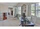 Cozy office space with natural light, modern desk, and comfortable seating at 1093 Muirfield Ct, Tarpon Springs, FL 34688