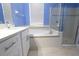 Clean bathroom featuring white cabinets, soaking tub, and stand-up shower stall at 12720 Whitney Meadow Way, Riverview, FL 33578