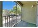 Screened balcony featuring calming outdoor space with lush landscaping at 13016 Sanctuary Cove Dr # 201, Temple Terrace, FL 33637