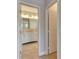 View of a bathroom with double sinks, granite countertop, and white cabinets at 13016 Sanctuary Cove Dr # 201, Temple Terrace, FL 33637