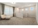 Cozy loft area with comfortable seating, neutral decor, and plenty of natural light at 1439 Gopher Loop, Tarpon Springs, FL 34689