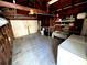 Spacious wooden garage featuring a washer, wash basin, shelving unit, and ample space at 160 16Th Ne Ave, St Petersburg, FL 33704